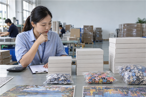 Shipment inspection of What should buyers check for price factors when sourcing custom puzzle? at a custom puzzle factory